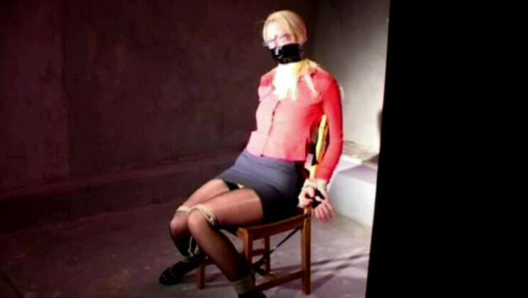 Dominique hogtied and leathergagged